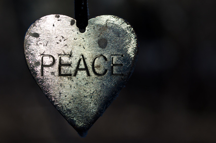 silver heart with letters engraved, peace, the spiritual lessons of war
