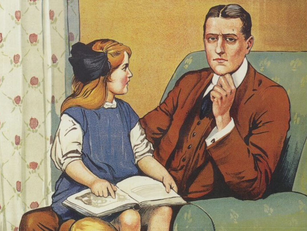 Father sitting in chair, daughter on his lap holding a book while looking at father inquiringly.